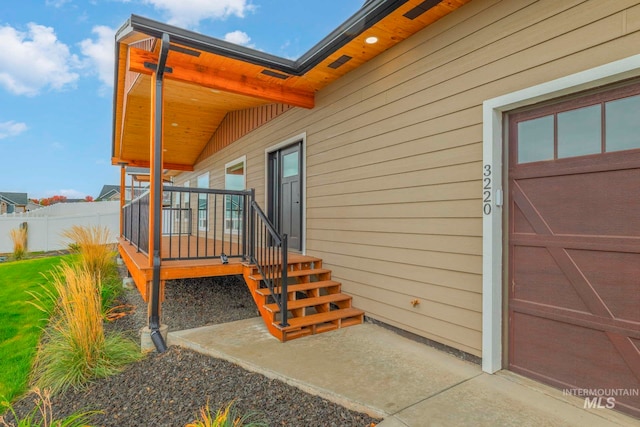 doorway to property with a deck