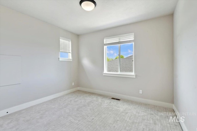 3303 S Island Fox Ave, Eagle, ID 83616 - carpeted spare room with baseboards