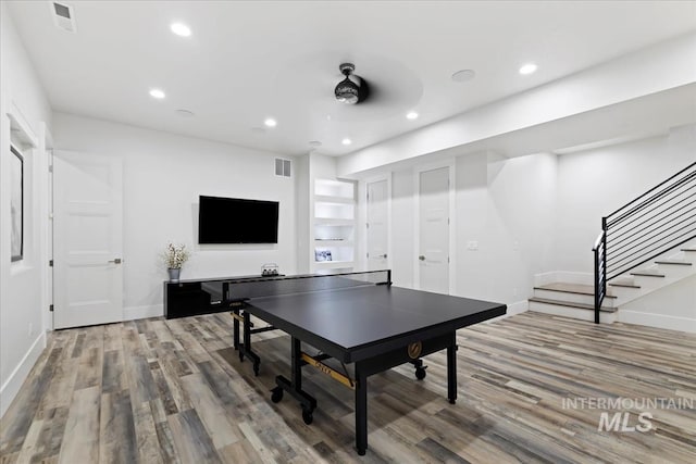 playroom with hardwood / wood-style flooring