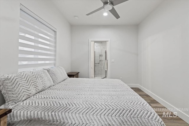 bedroom with ceiling fan and dark hardwood / wood-style flooring