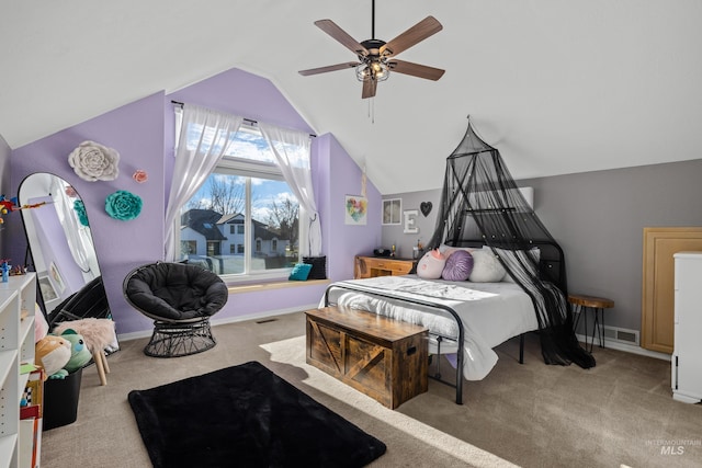 bedroom featuring light carpet, vaulted ceiling, and ceiling fan