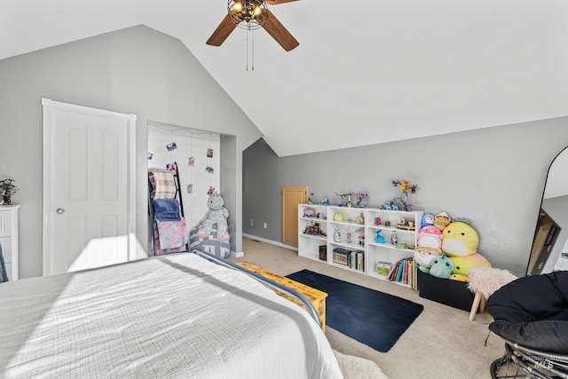 bedroom with carpet flooring, vaulted ceiling, and ceiling fan