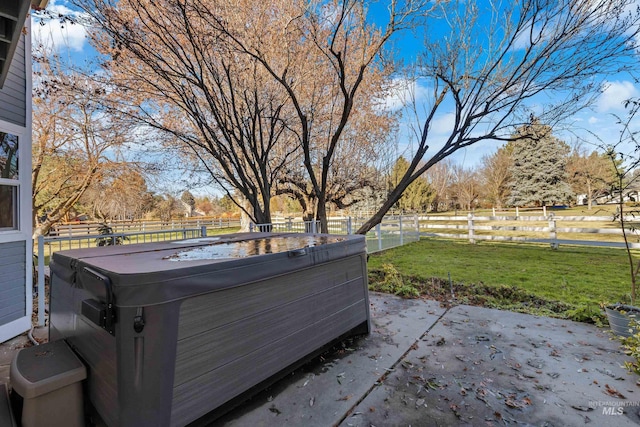 view of patio / terrace with a hot tub