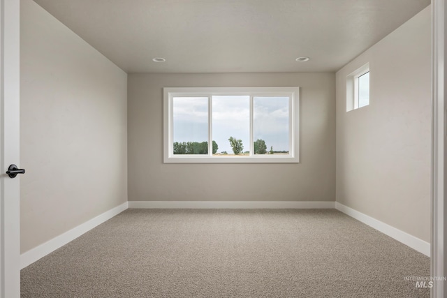 7017 S Zenith Ave, Meridian, ID 83642 - carpeted spare room featuring baseboards and recessed lighting