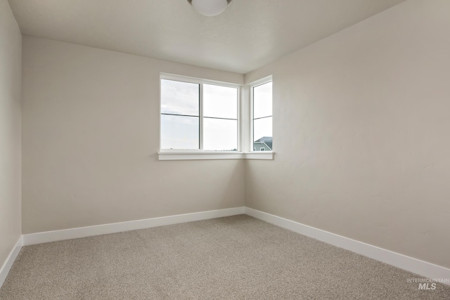 7017 S Zenith Ave, Meridian, ID 83642 - carpeted spare room featuring baseboards