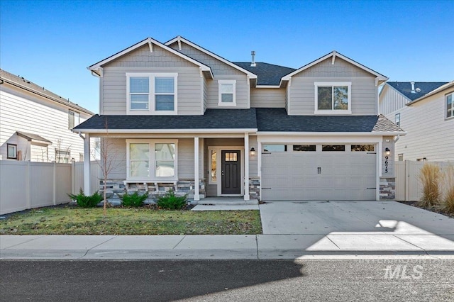 craftsman-style home featuring a porch and a garage