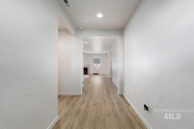 hall featuring light hardwood / wood-style floors