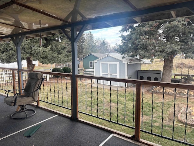 exterior space with an outbuilding and a shed