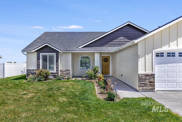 741 Gregory Way, Twin Falls, ID 83301 - craftsman inspired home with stone siding, an attached garage, board and batten siding, and a shingled roof