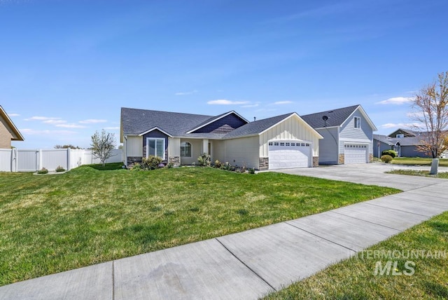 741 Gregory Way, Twin Falls, ID 83301 - ranch-style house featuring stone siding, board and batten siding, concrete driveway, a garage, and a shingled roof