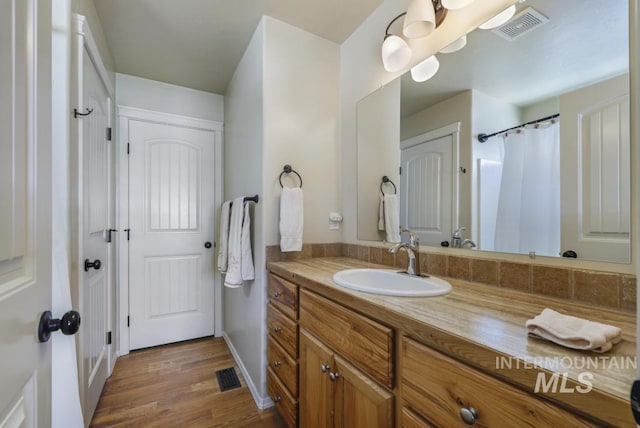 741 Gregory Way, Twin Falls, ID 83301 - full bath with wood finished floors and vanity