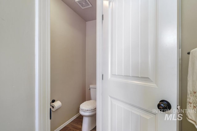 741 Gregory Way, Twin Falls, ID 83301 - bathroom with toilet and wood finished floors