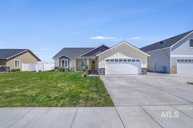 741 Gregory Way, Twin Falls, ID 83301 - ranch-style home featuring board and batten siding, stone siding, a garage, and concrete driveway