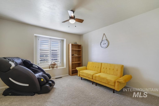 741 Gregory Way, Twin Falls, ID 83301 - carpeted living area with ceiling fan and baseboards