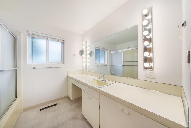 18822 Chicken Dinner Rd, Caldwell, ID 83607 - bathroom with vanity, a healthy amount of sunlight, and combined bath / shower with glass door