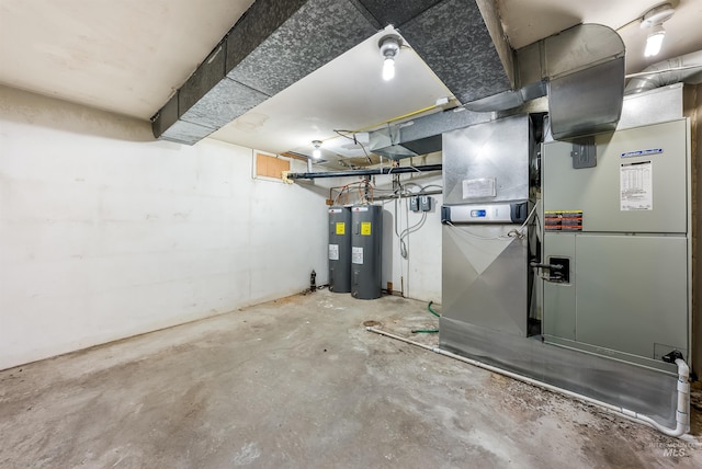 18822 Chicken Dinner Rd, Caldwell, ID 83607 - utility room featuring electric water heater and heating unit