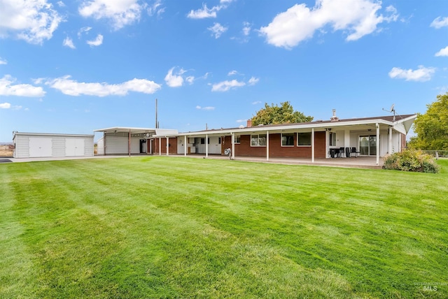 18822 Chicken Dinner Rd, Caldwell, ID 83607 - rear view of property featuring a yard, a patio area, and ceiling fan