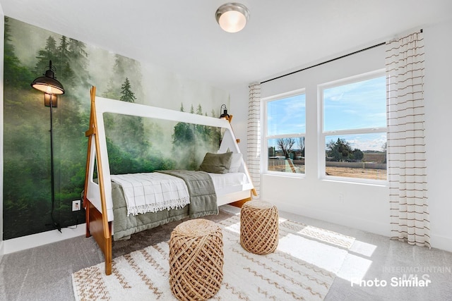 living area featuring baseboards