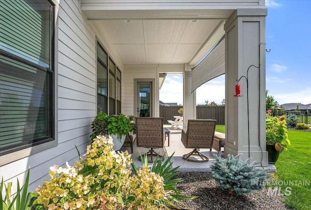 view of patio / terrace with fence