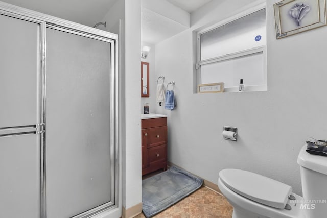 15201 Christopher, Caldwell, ID 83607 - full bathroom featuring toilet, vanity, and a stall shower