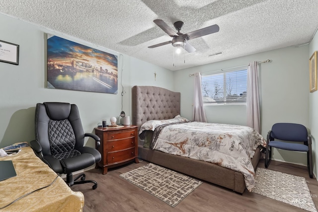 15201 Christopher, Caldwell, ID 83607 - bedroom with wood finished floors, a textured ceiling, and ceiling fan
