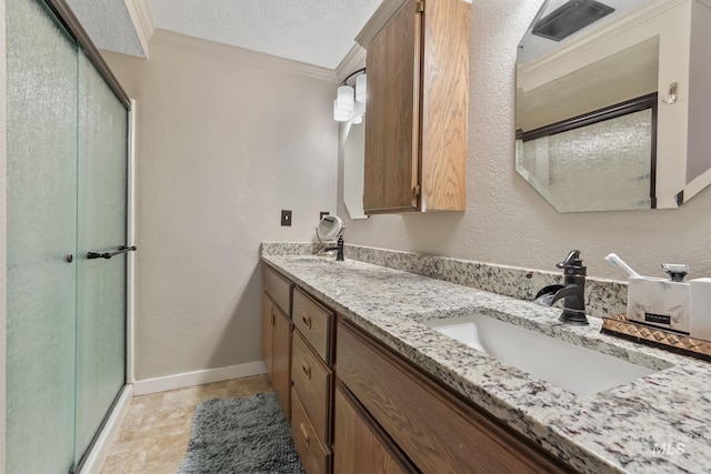 15201 Christopher, Caldwell, ID 83607 - full bath featuring double vanity, ornamental molding, a shower stall, a textured ceiling, and baseboards