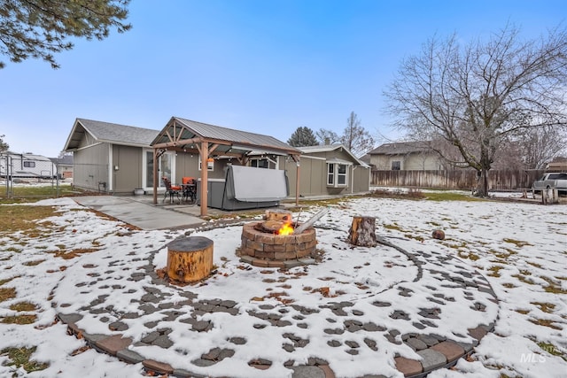 15201 Christopher, Caldwell, ID 83607 - snow covered house with a fire pit, a gazebo, an outbuilding, a patio, and a gate