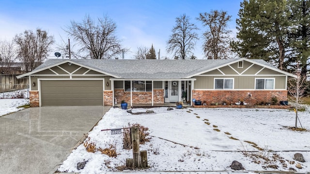 15201 Christopher, Caldwell, ID 83607 - view of front of property with brick siding, concrete driveway, an attached garage, and a shingled roof