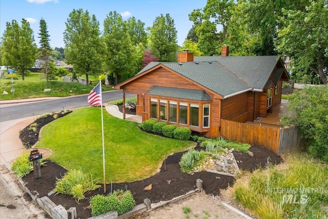 4523 N Mountain View Dr, Boise, ID 83704 - rear view of property with a chimney and roof with shingles