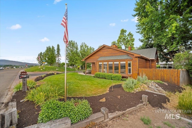 4523 N Mountain View Dr, Boise, ID 83704 - rear view of house featuring a chimney