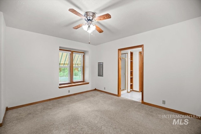 4523 N Mountain View Dr, Boise, ID 83704 - unfurnished room featuring a ceiling fan and light colored carpet