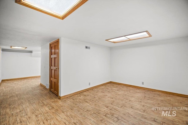 4523 N Mountain View Dr, Boise, ID 83704 - spare room with light wood-type flooring and baseboards