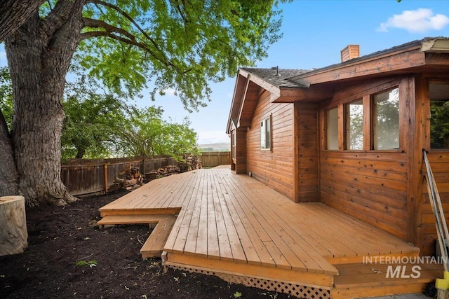 4523 N Mountain View Dr, Boise, ID 83704 - wooden deck with a fenced backyard