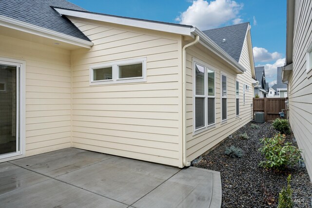 6257 N Vicenza Ln, Meridian, ID 83646 - view of side of home featuring a patio and central air condition unit