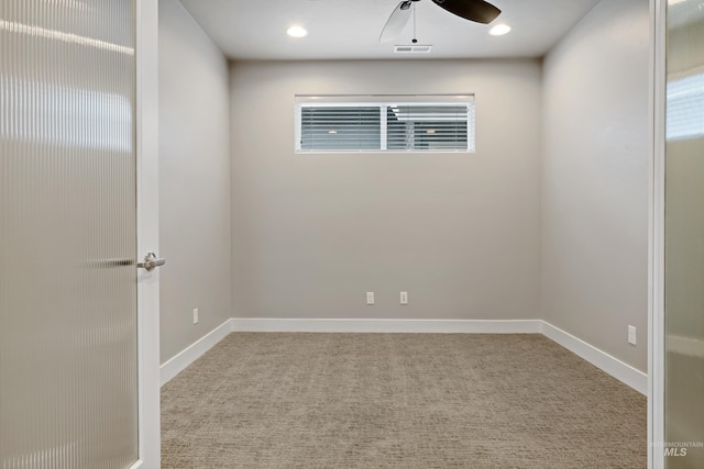 6257 N Vicenza Ln, Meridian, ID 83646 - spare room featuring ceiling fan and light carpet