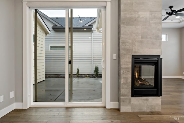 6257 N Vicenza Ln, Meridian, ID 83646 - interior space featuring ceiling fan, a fireplace, and hardwood / wood-style floors