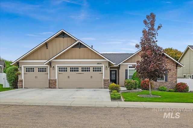 3524 Catalina Ave, Caldwell, ID 83605 - craftsman house with stone siding, board and batten siding, a garage, and driveway