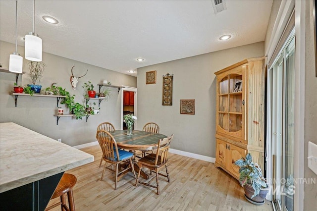 3524 Catalina Ave, Caldwell, ID 83605 - dining space featuring light wood-style floors, baseboards, and recessed lighting