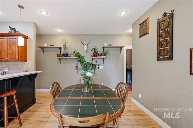 3524 Catalina Ave, Caldwell, ID 83605 - dining room featuring light wood-style floors, recessed lighting, and baseboards