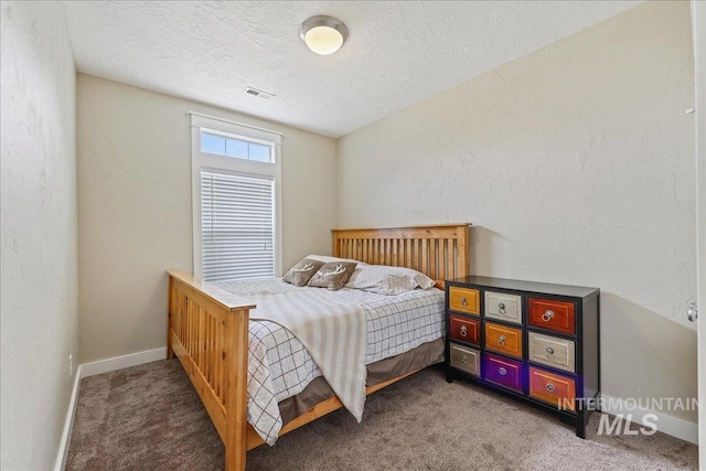 3524 Catalina Ave, Caldwell, ID 83605 - carpeted bedroom with a textured ceiling and baseboards