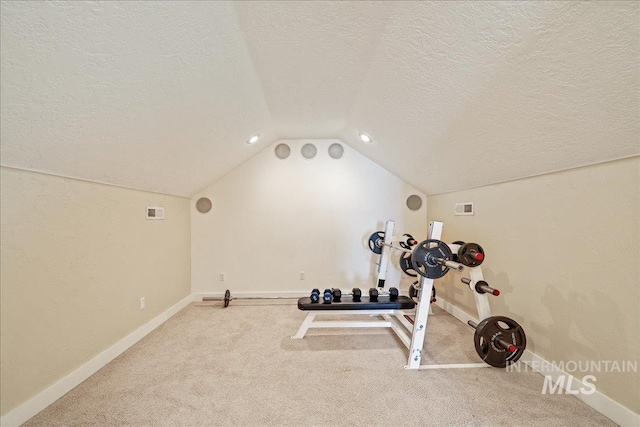 3524 Catalina Ave, Caldwell, ID 83605 - workout area with vaulted ceiling, a textured ceiling, carpet flooring, and baseboards