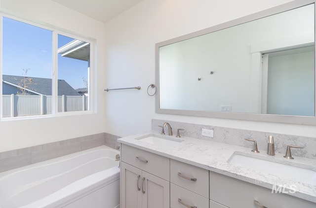 2111 W Gelding St, Middleton, ID 83644 - bathroom featuring a bath and double vanity
