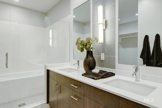 bathroom with vanity and an enclosed shower