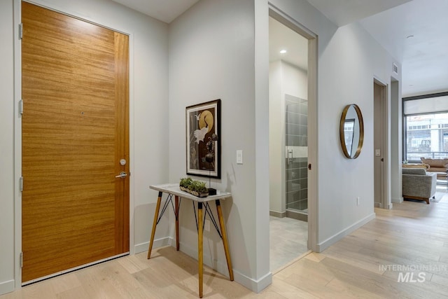 entrance foyer with light hardwood / wood-style flooring