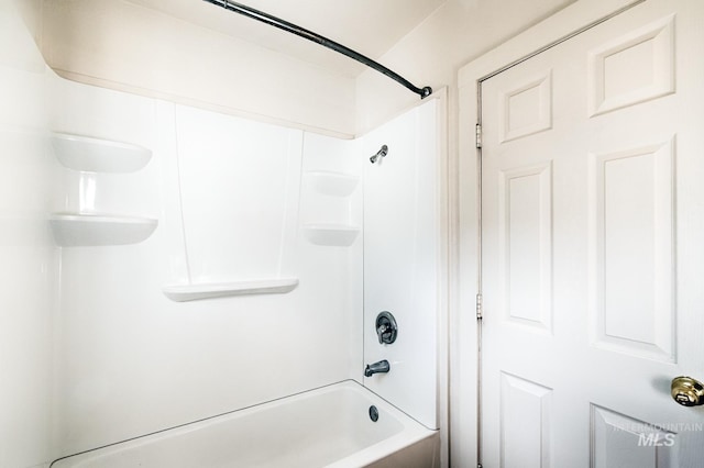 bathroom with shower / bathing tub combination