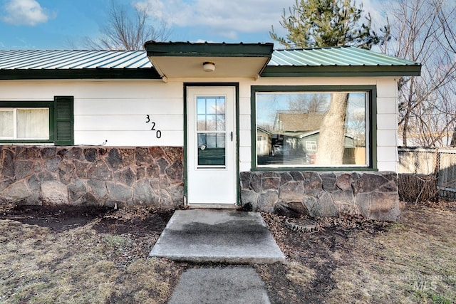 entrance to property with metal roof