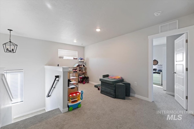 game room with visible vents, recessed lighting, an inviting chandelier, carpet flooring, and baseboards