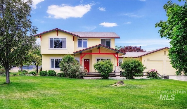 2021 W Ardell Rd, Kuna, ID 83634 - view of front of house featuring a garage and a front lawn