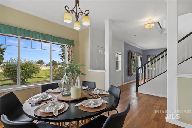 2021 W Ardell Rd, Kuna, ID 83634 - dining space with plenty of natural light, wood finished floors, stairway, and baseboards