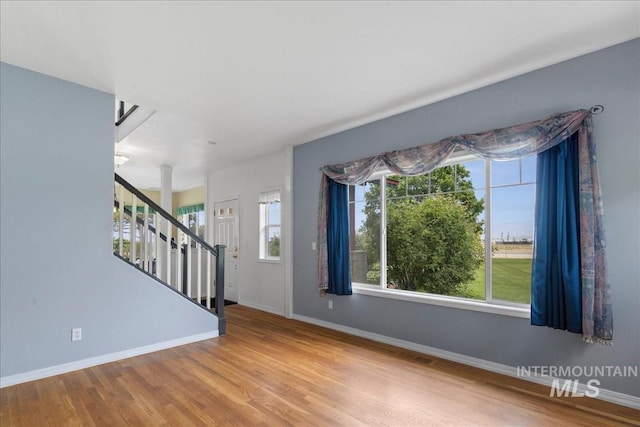 2021 W Ardell Rd, Kuna, ID 83634 - entrance foyer with stairs, baseboards, and wood finished floors